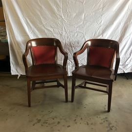 Wood and leather armchairs