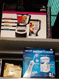 New in Box!  Ninja and Waterpik Water Flosser
