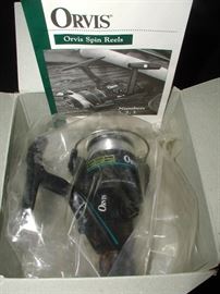 New Orvis spincasting reel, also New associated Orvis panfish rod in bag/storage case. Plus, new Shimano spincasting rod in b ag