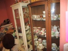 Tons of tea cups and several curios