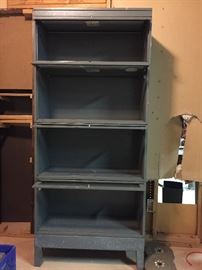 Stackable steel shelving unit with individual glass doors