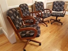 Four rolling kitchen chairs