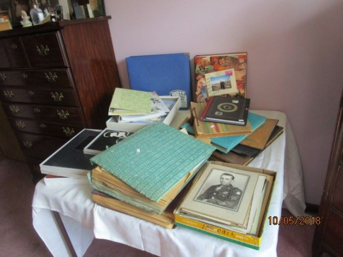 New picture albums and vintage scrapbooks as well as old photographs