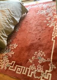 Asian rust colored area rug