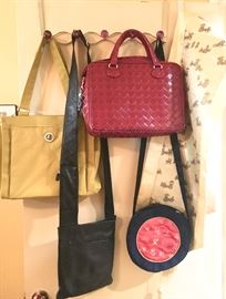 Various purses including many Coach 