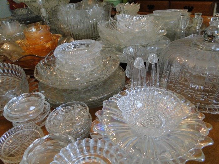 Lots of beautiful dishes and serving pieces