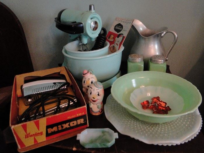 So many vintage items, including 1930's Jadeite and a Waring Mixer still in the box.  The Humpty Dumpty Salt and Pepper Shakers are adorable!