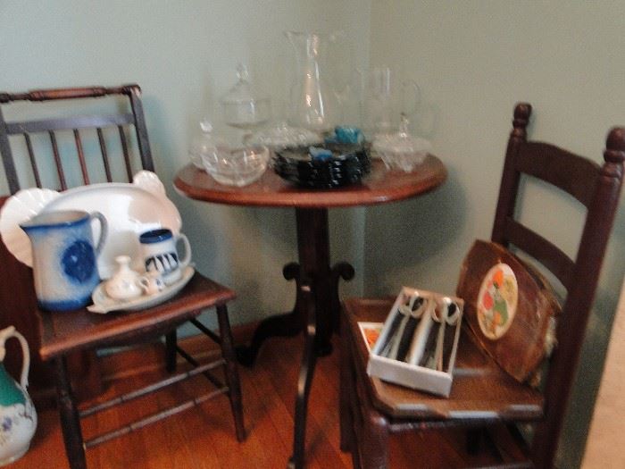 Cane Bottom Chairs and  an occasional table, a Pfaltzgraff Turkey Platter, and beautiful pottery