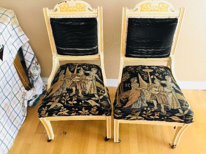 2 old chairs on wheels