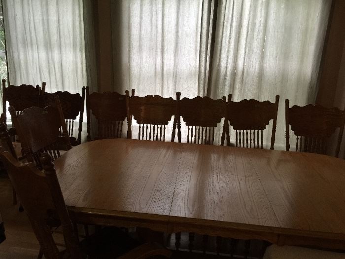 Oak dining table with 8 chairs
