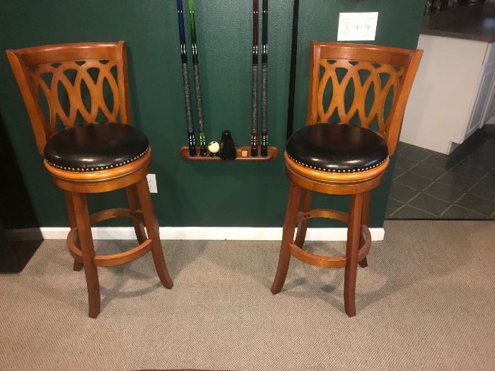 2 leather bar/billiard stools.
