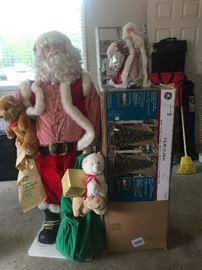 Life-size Santa and 7.5 foot pre-lit (white or colored) Christmas Tree!
