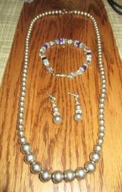 Sterling silver graded bead necklace and earrings.  Sterling silver bracelet w/ stones