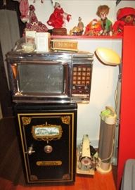 Misc clown collectibles, older microwave, Dorm fridge that looks like a safe