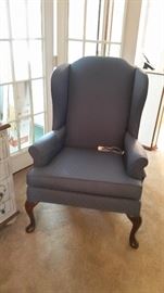 One of several wingback chairs.
