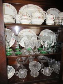 filled with vintage glassware and china