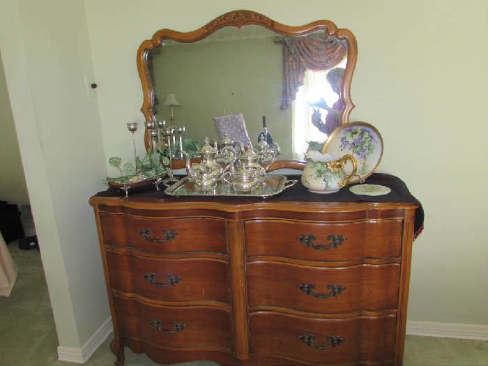 Chest and mirror match twin beds.
