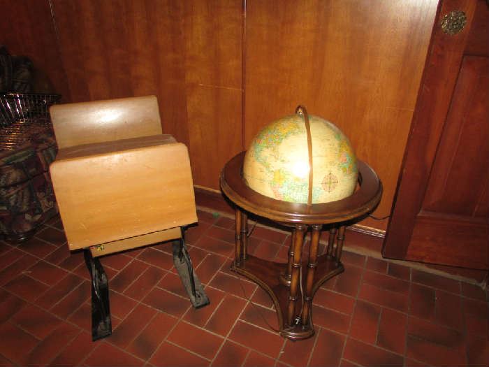 Old school desk from a Mesquite school and lighted globe on stand.