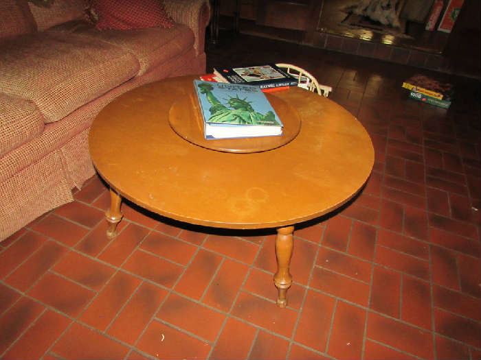 Wonderful round maple coffee table with attached lazy susan.