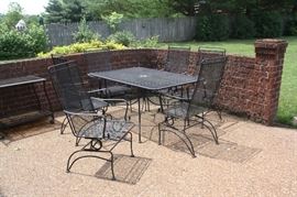 Vintage patio set with 6 spring chairs.  