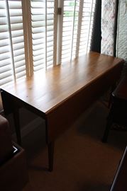 Antique drop leaf table.  I will take a better photo and repost today.  Very nice