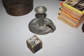 Cardboard pin cushion and antique candle holder