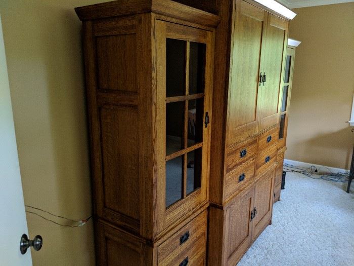 Bookcase/curio cabinet.  Can be separated into 3 pieces