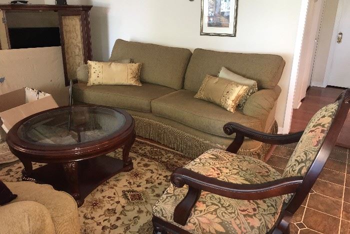 High End Matching Fringe Sofa and Loveseat (sold separately or together). Extra set of cushions included. Solid wood coffee table with beveled glass insert, solid wood chair with brocade fabric, lots of high end rugs and artwork as well!