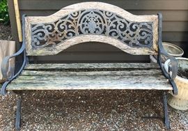 old garden bench - great as is for a garden ornament or a  little TLC for use.  Metal is Wrought Iron. 