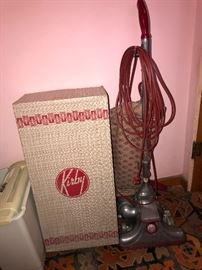 Vintage Kirby vacuum with attachments