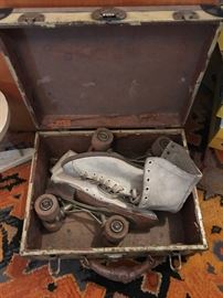 Vintage roller skates and case