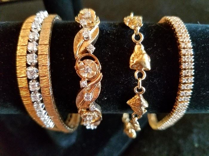 14 kt. gold & diamond tennis bracelet, 14 kt. gold & diamond flower bracelet, l4 kt. gold nugget bracelet, 14 kt. gold & diamond tennis bracelet (the 2 in the middle are very small)