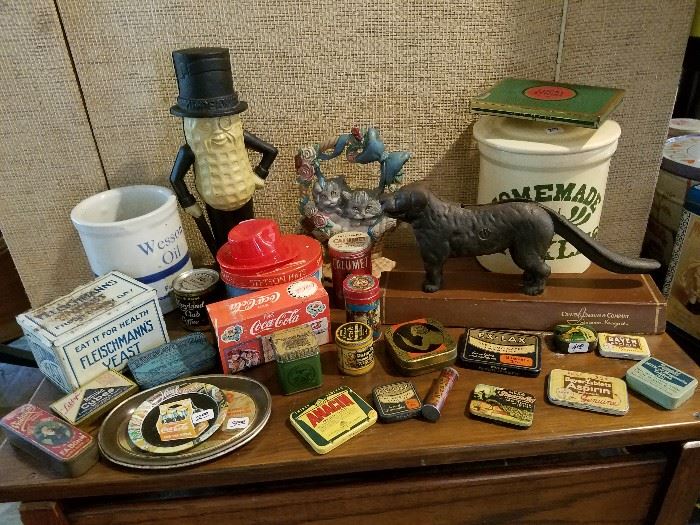 Vintage tins, Wesson Oil crock, Mr. Peanut bank, cast iron door stop, cast iron dog nutcracker