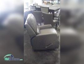 leather rocker recliner swiveling with pull up foot rest