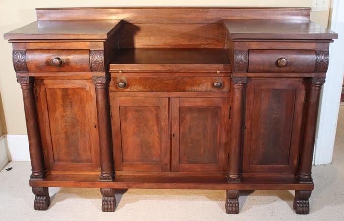 051a  Large Mahogany Empire sideboard with claw feet, silver drawer and serving slide, 47 in. T, 71 in. W, 18 in. D.