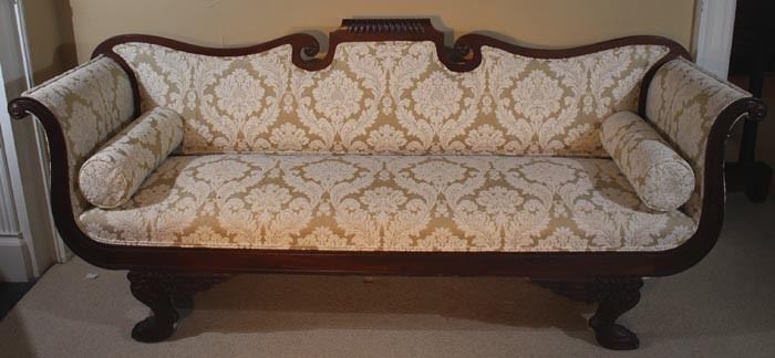 057a  Mahogany Federal sofa with winged carved legs and new Victorian style upholstery, 36 in T, 85 in. W, 24 in. D.