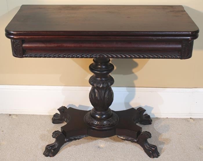 080a  Mahogany Empire game table with acanthus carved base and claw feet, 29 in. T, 36 in. W, 18 in. D.