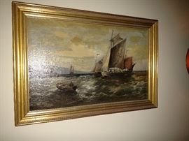 Framed oil painting on canvas depicting ships at sea