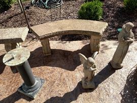 Concrete yard art, sundial and statues