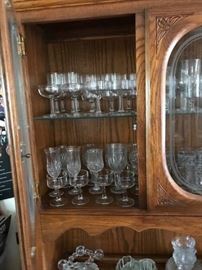 China Hutch, and lots of stemmed glassware, lots of odds and ends glassware.