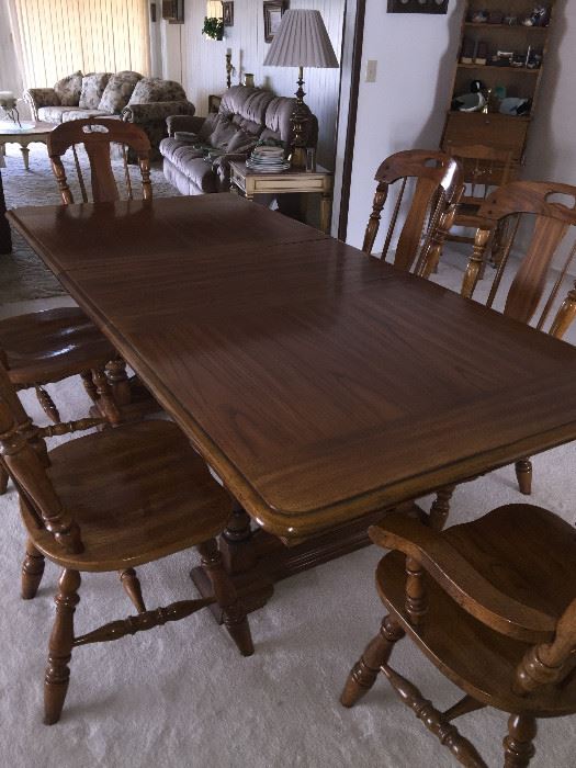 Dining room table with 2 captain chairs and 4 side chairs  with leaf   approx 30 inch ht  42 inch wide and 6 ft long, this includes the leaf   (leaf by itself 18 inch)