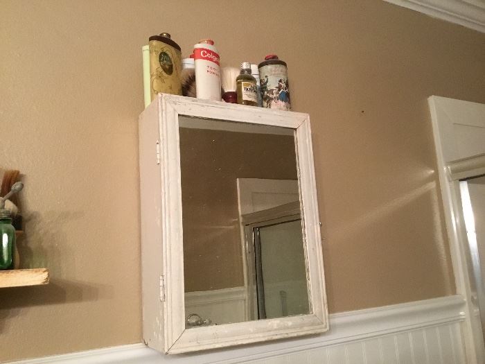 Some of powder tins & vintage bottles - wooden medicine cabinet with mirror in door