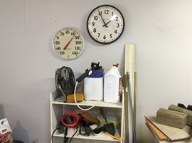 Clock, temperature gauge, small white shelf