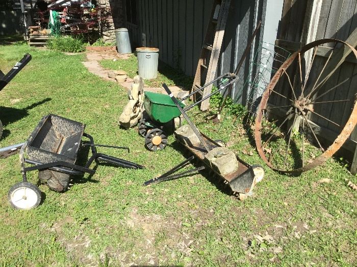 Old wagon wheel & hand made plow