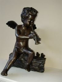 Bronzed winged figure
