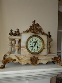 Onyx and ormolu mantle clock (crack to front of marble).  Runs and stops.