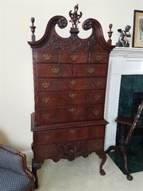 Beautiful Flame Mahogany highboy by the Northern Furniture Company, Sheboygan, WI.  Early 20th century.  Nicely carved