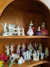 Porcelain figurines including Royal Doulton