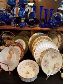 Lots of plates, and blue glass