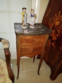 Two drawer diminutive stand with marble top. 